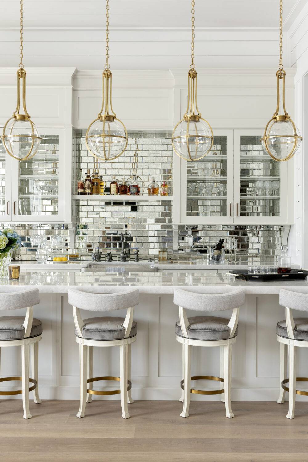 Bar with mirrored glass tile background. 